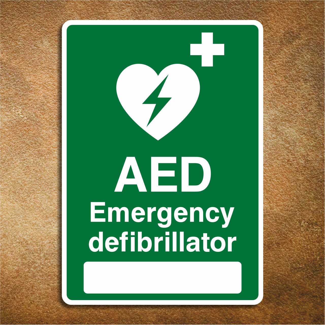 AED Emergency Defibrillator Located At: Sign