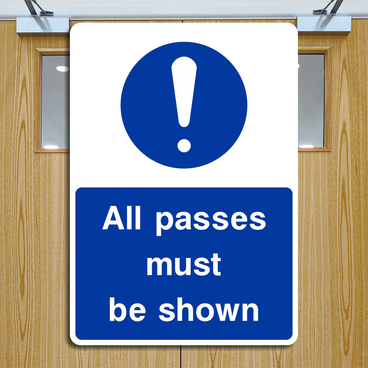 All Passes Must Be Shown Sign