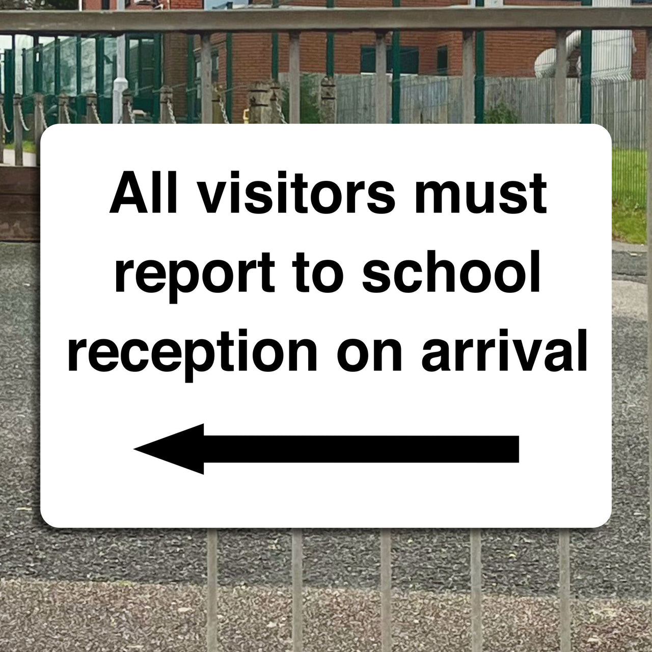 All Visitors Must Report To School Reception On Arrival with a Left Pointing Directional Arrow