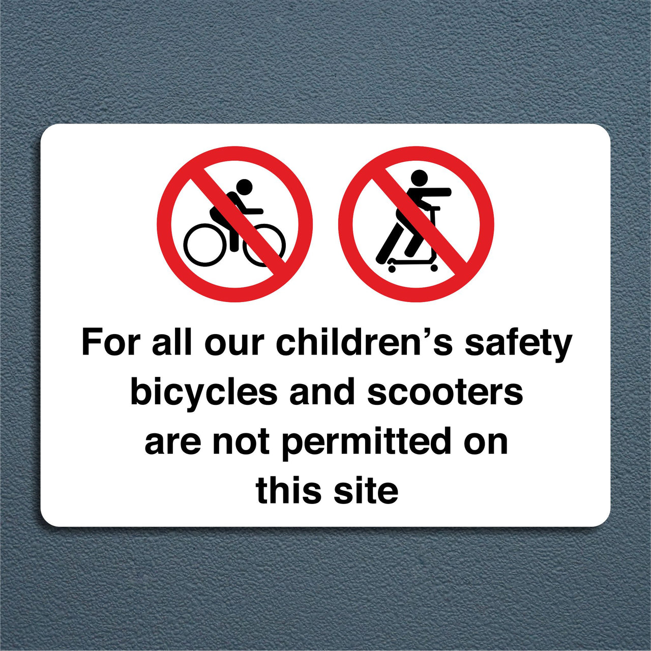 For All Our Children's Safety Bicycles And Scooters Are Not Permitted On This Site Sign