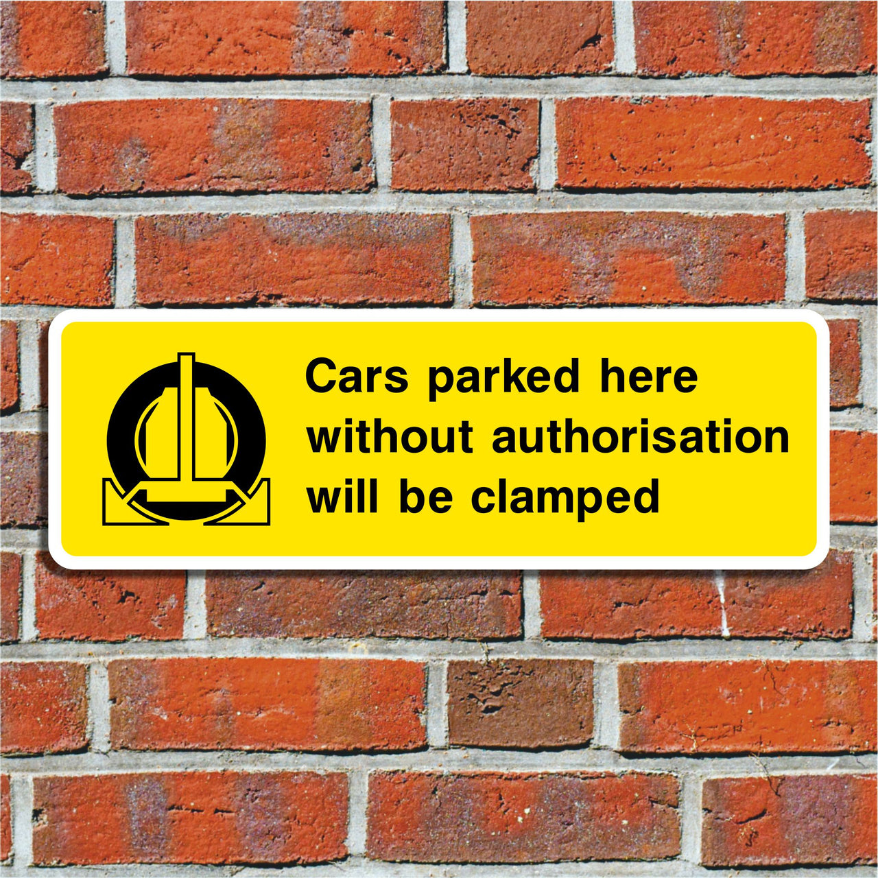 Cars Parked Here Without Authorisation Will Be Clamped Sign