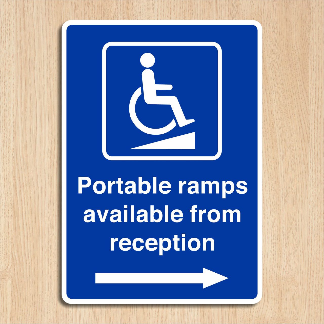Portable Ramps Available From Reception Sign with a Right Pointing Directional Arrow