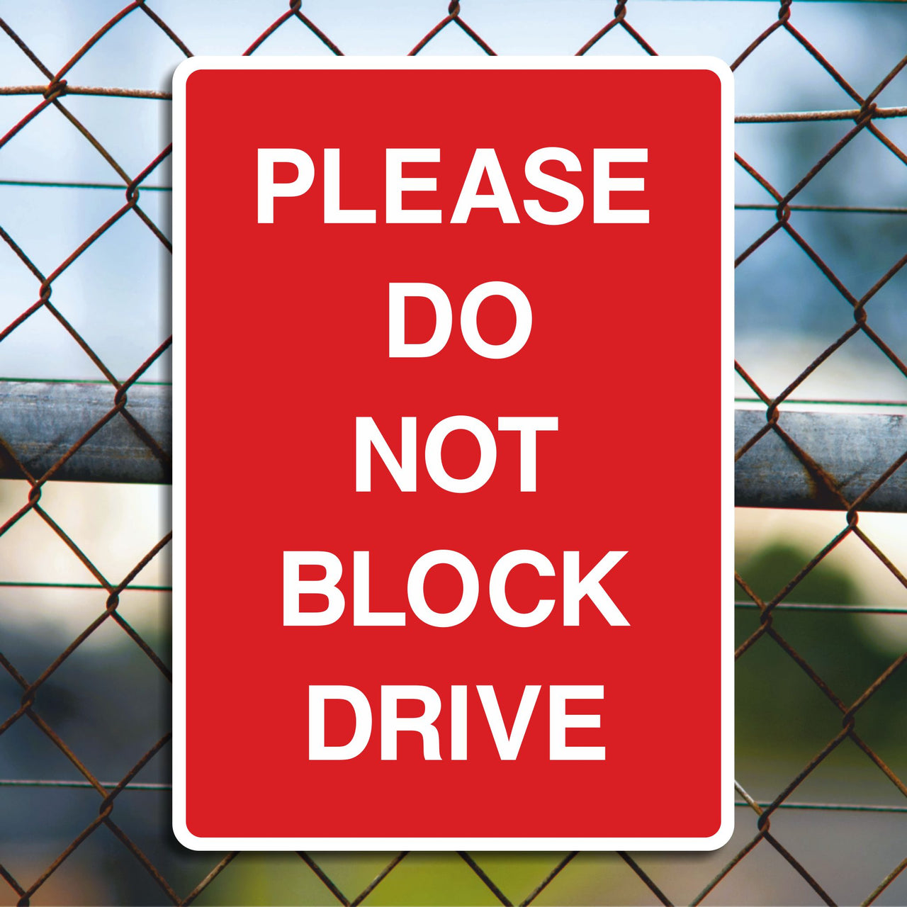 Please Do Not Block Drive Sign