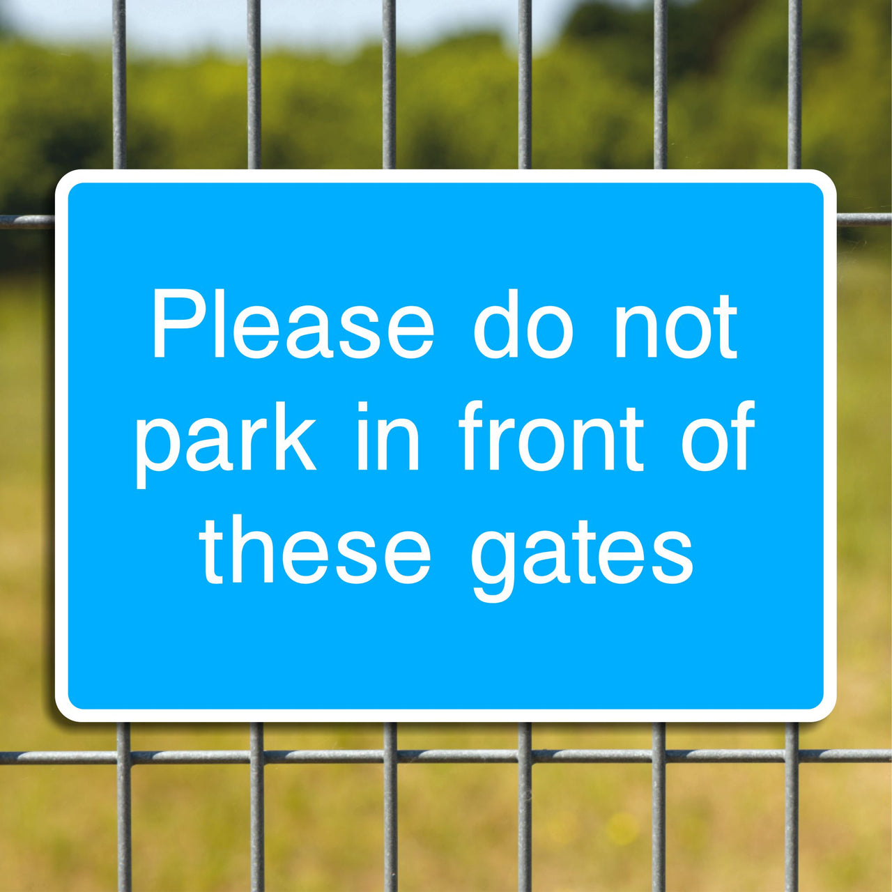Please Do Not Park In Front Of These Gates Sign