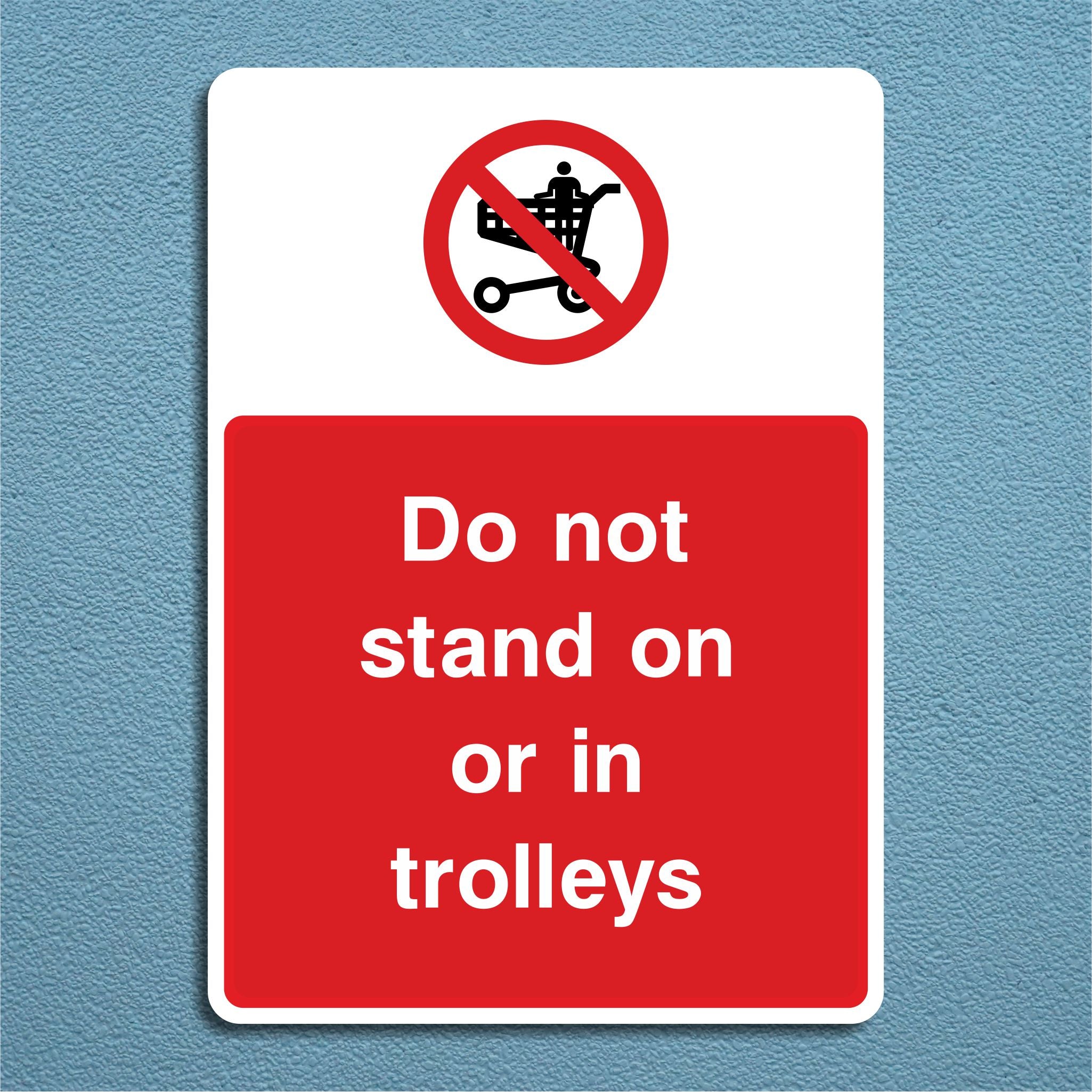 Do Not Stand On Or In Trolleys Sign