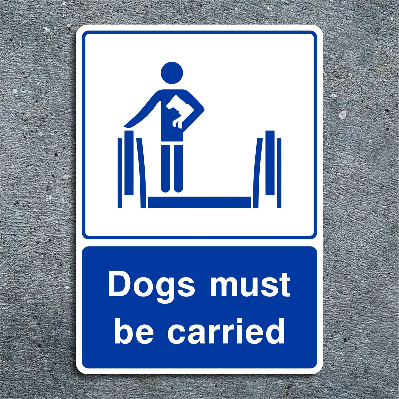 Dogs Must Be Carried on Escalator Sign