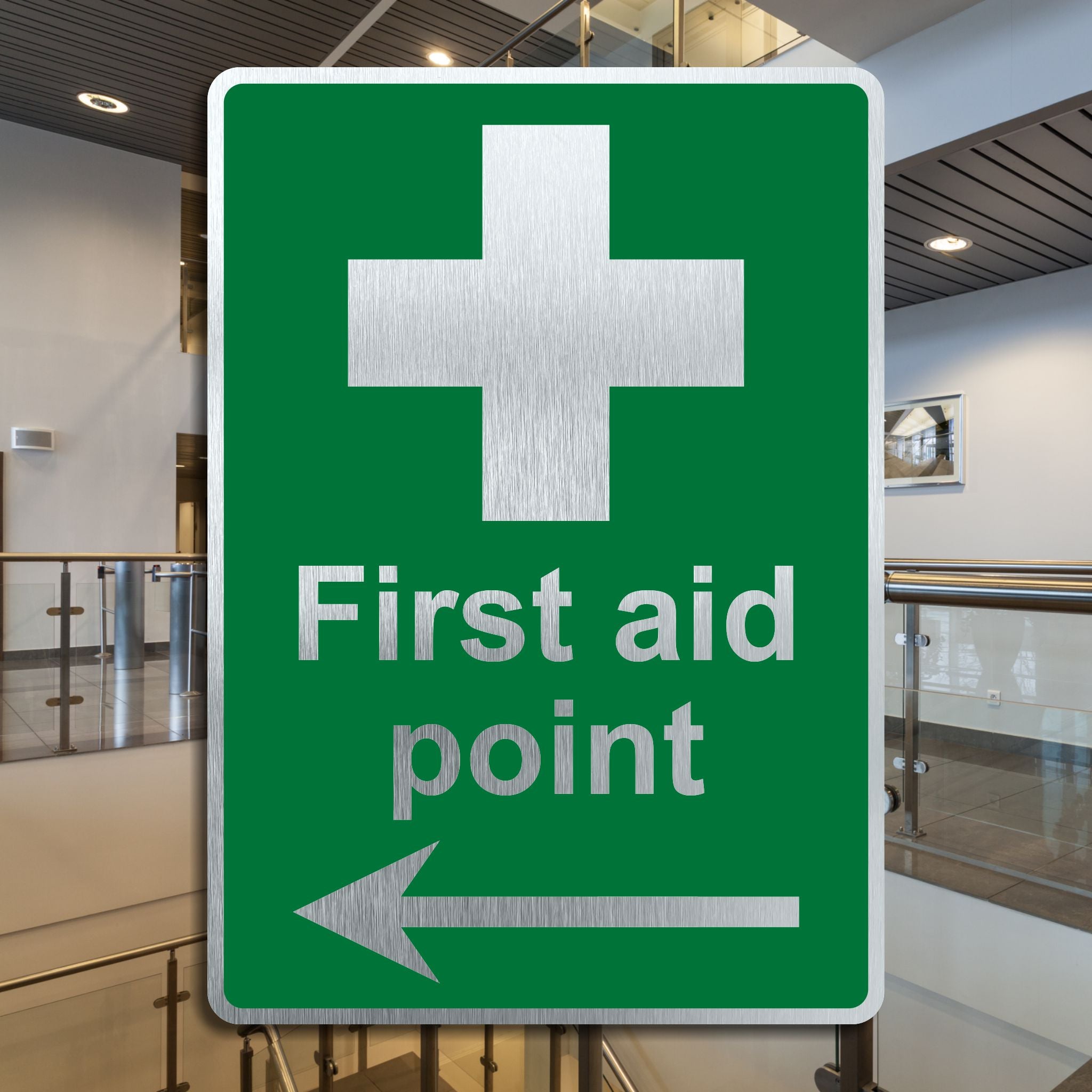 Brushed Aluminium First Aid Point Sign with a Left Pointing Directiona
