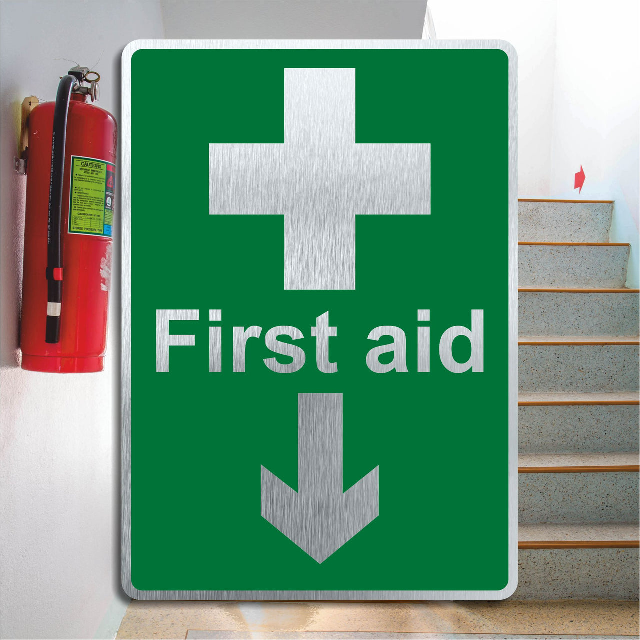 Brushed Silver Aluminium First Aid Sign with a Down Directional Arrow