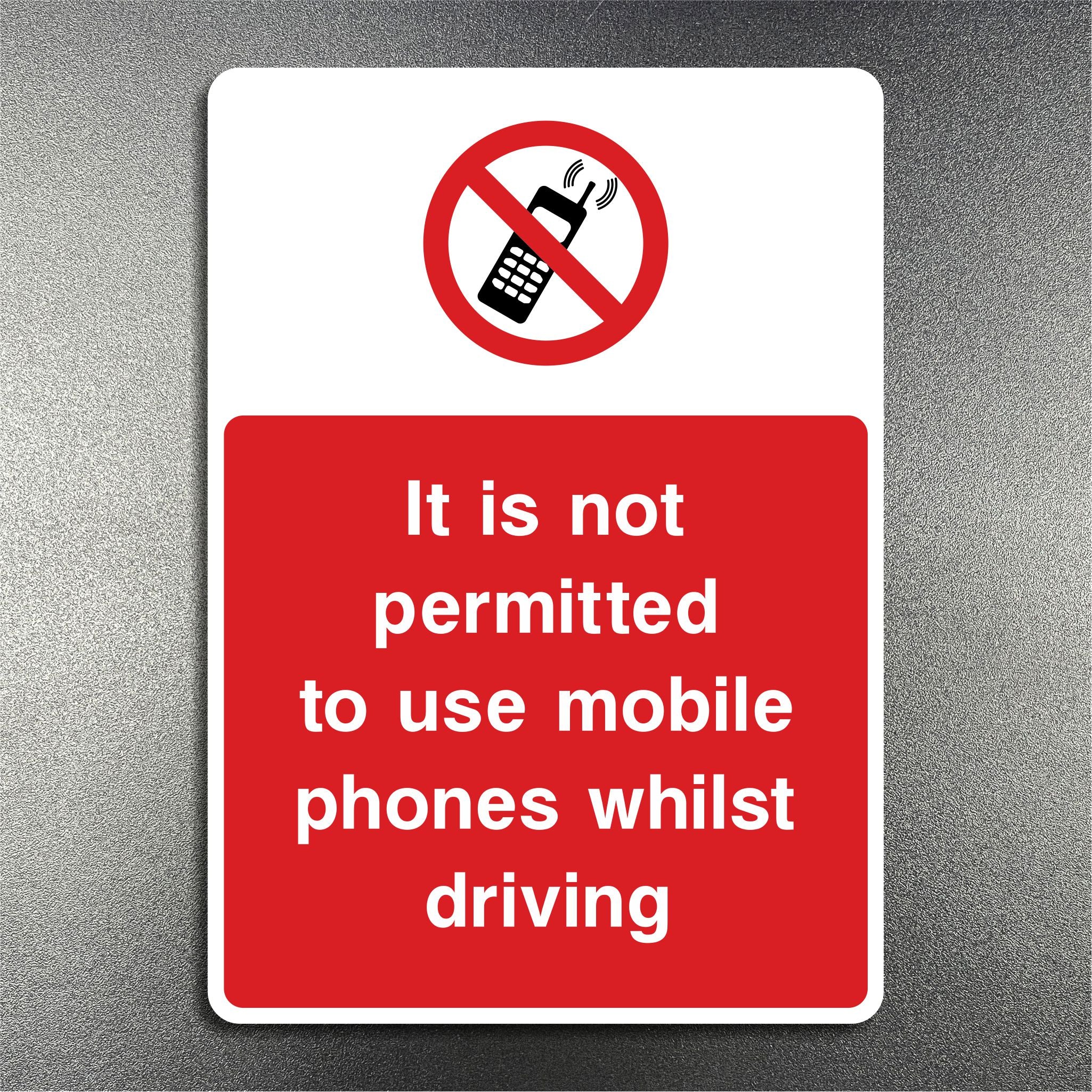 It Is Not Permitted To Use Mobile Phones Whilst Driving Sign