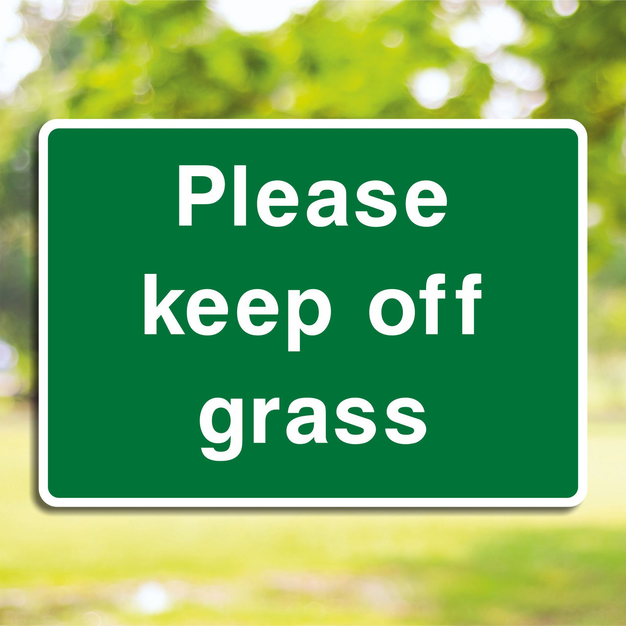 Please Keep Off The Grass Sign