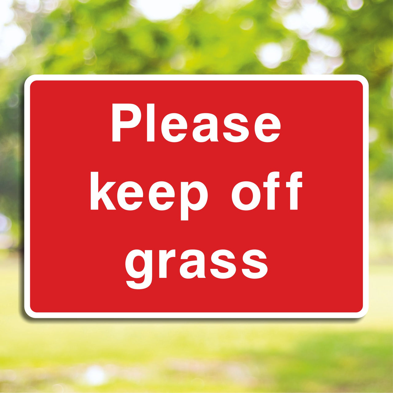 Please Keep Off The Grass Sign