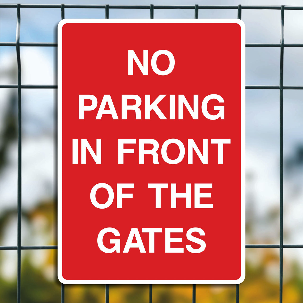 No Parking In Front Of The Gates Sign