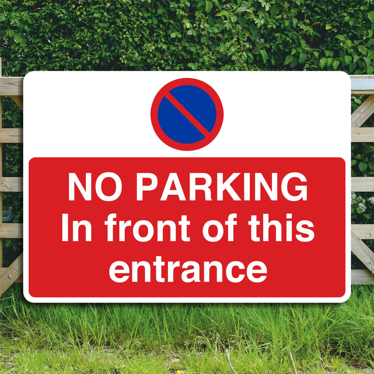 No Parking In Front Of This Entrance Sign