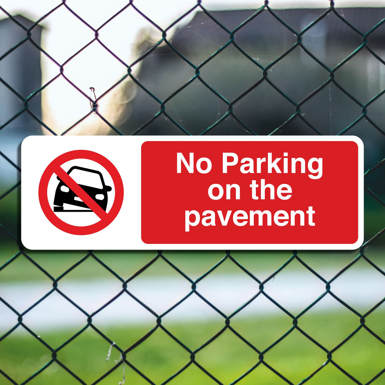 No Parking On The Pavement Sign