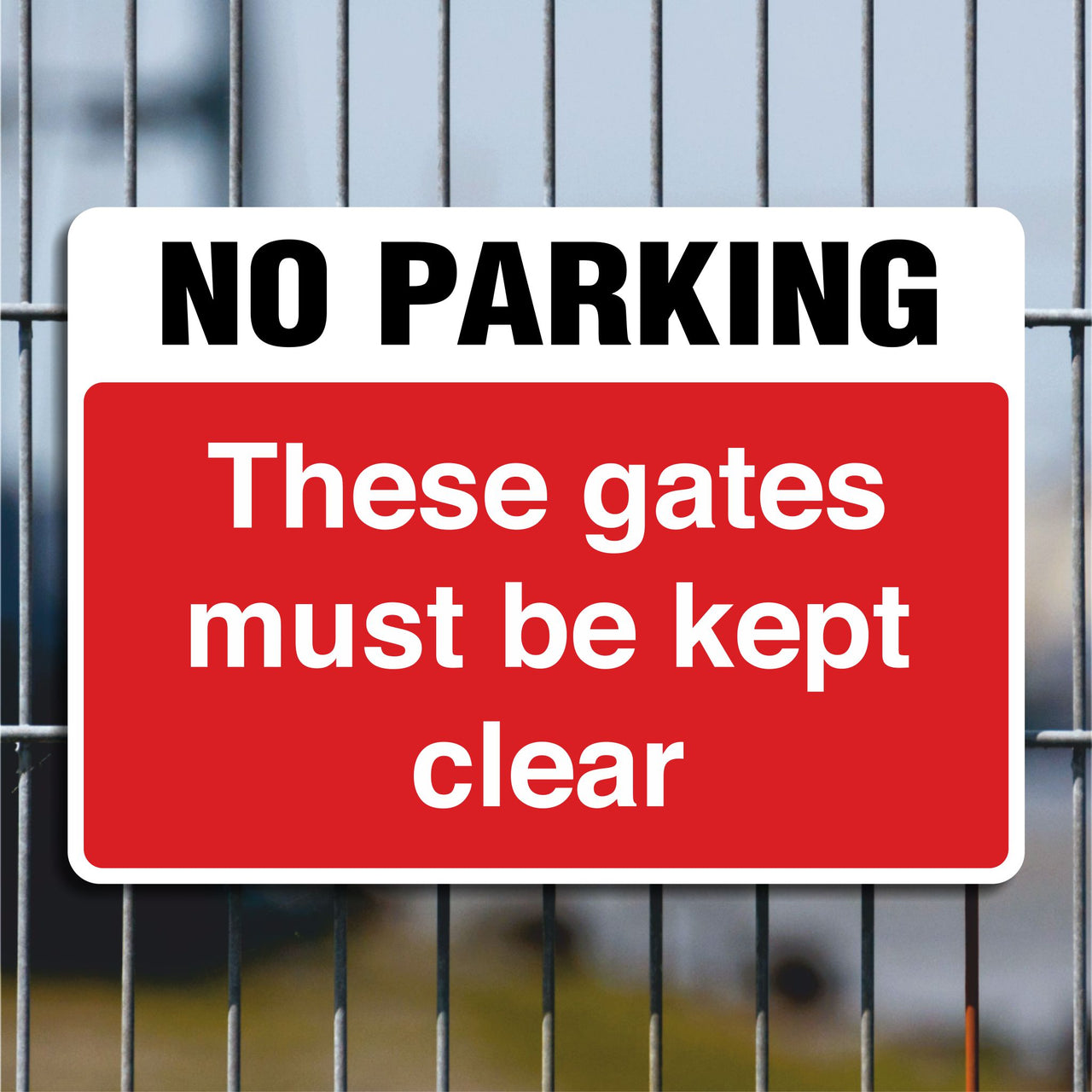 No Parking These Gates Must Be Kept Clear Sign