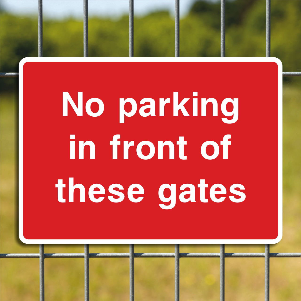 No Parking In Front Of These Gates Sign
