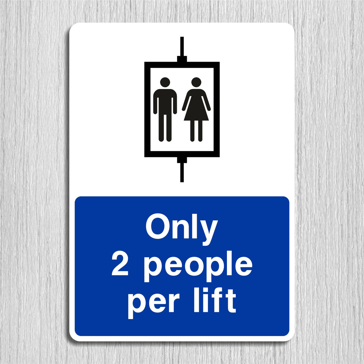 Only 2 People Per Lift Sign