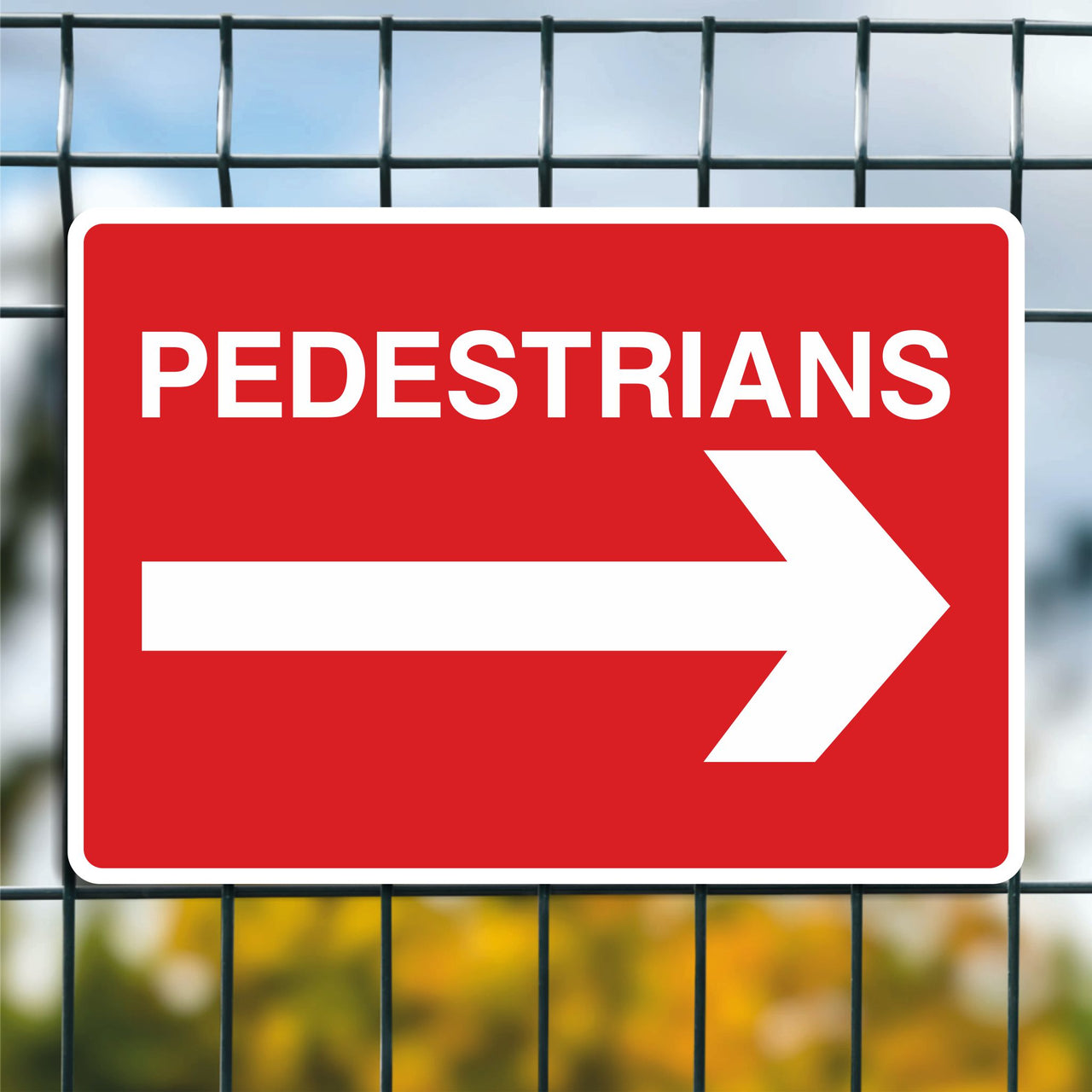 Pedestrians Signs With a Right Pointing Arrow