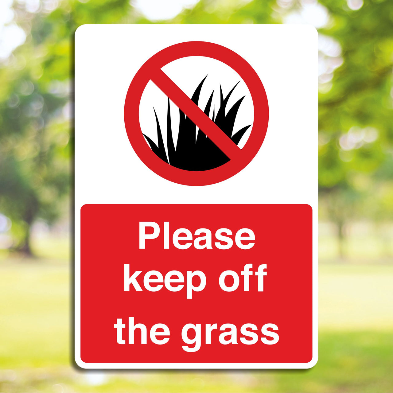 Please Keep Off The Grass Sign