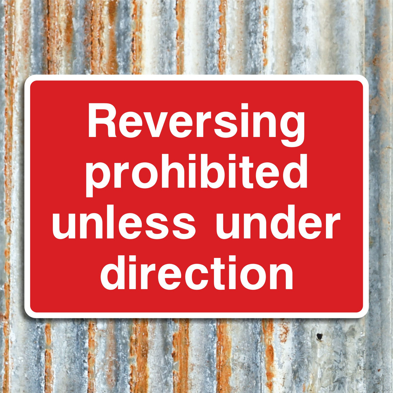 Reversing Prohibited Unless Under Direction Sign