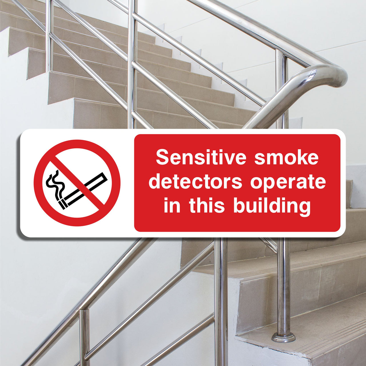 Sensitive Smoke Detectors Operate In This Building Sign