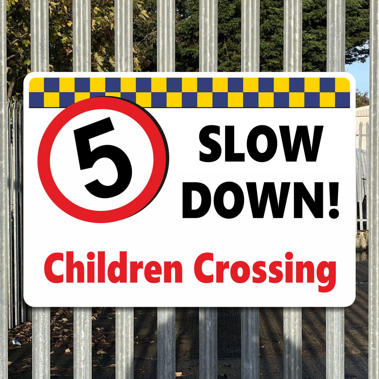 Slow Down Children Crossing Sign