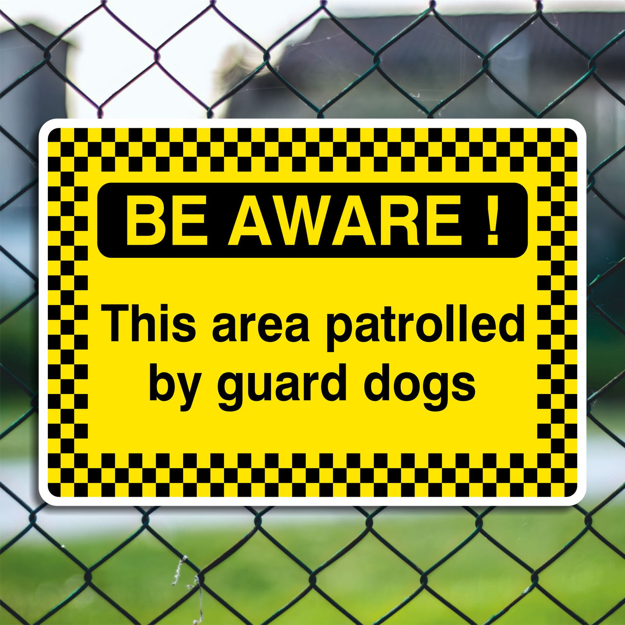 Be Aware! This Area Patrolled By Guard Dogs Sign