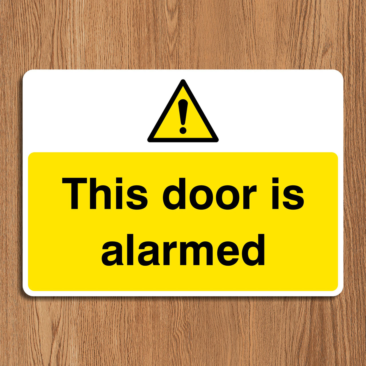 This Door Is Alarmed Sign