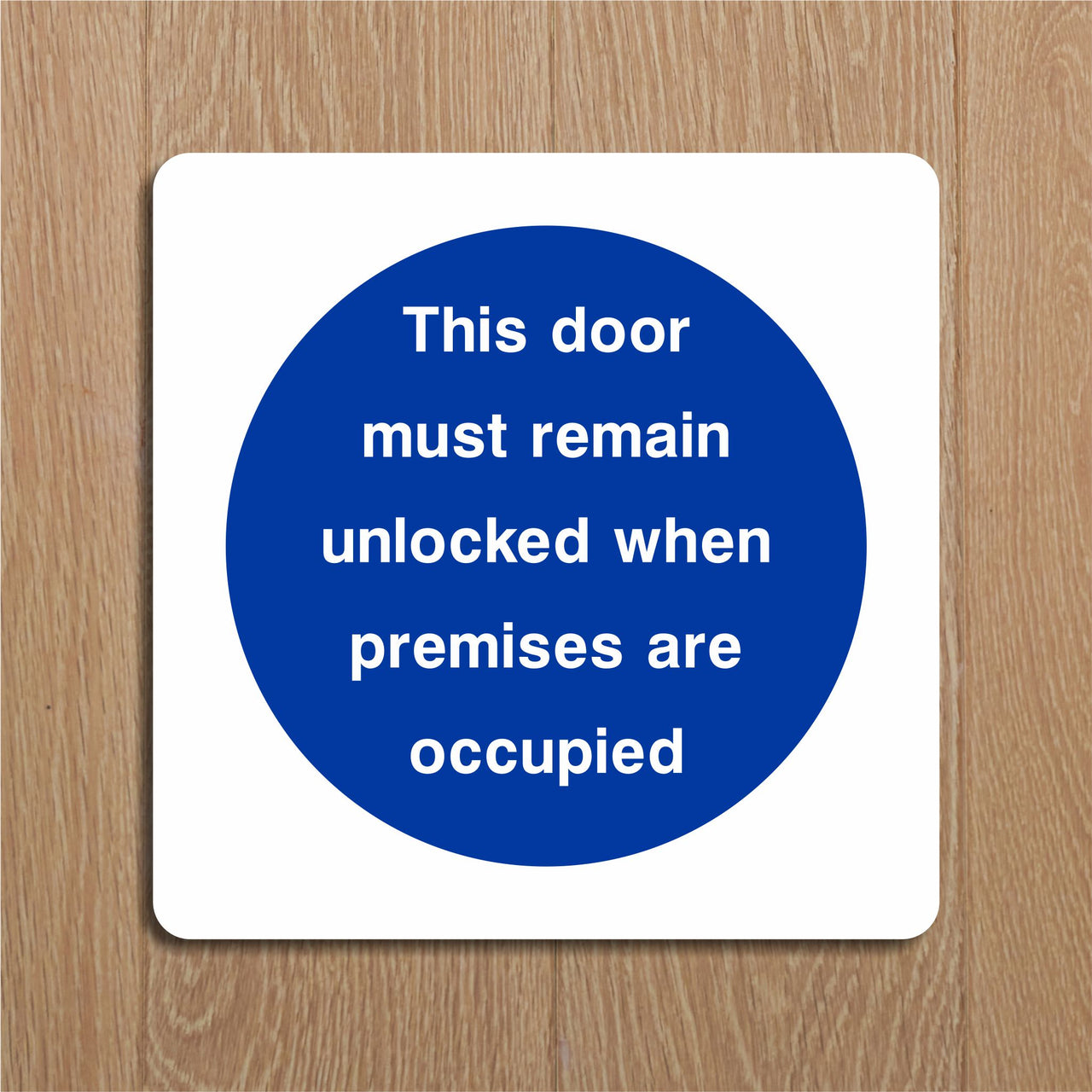 This Door Must Remain Unlocked When Premises Are Occupied Sign