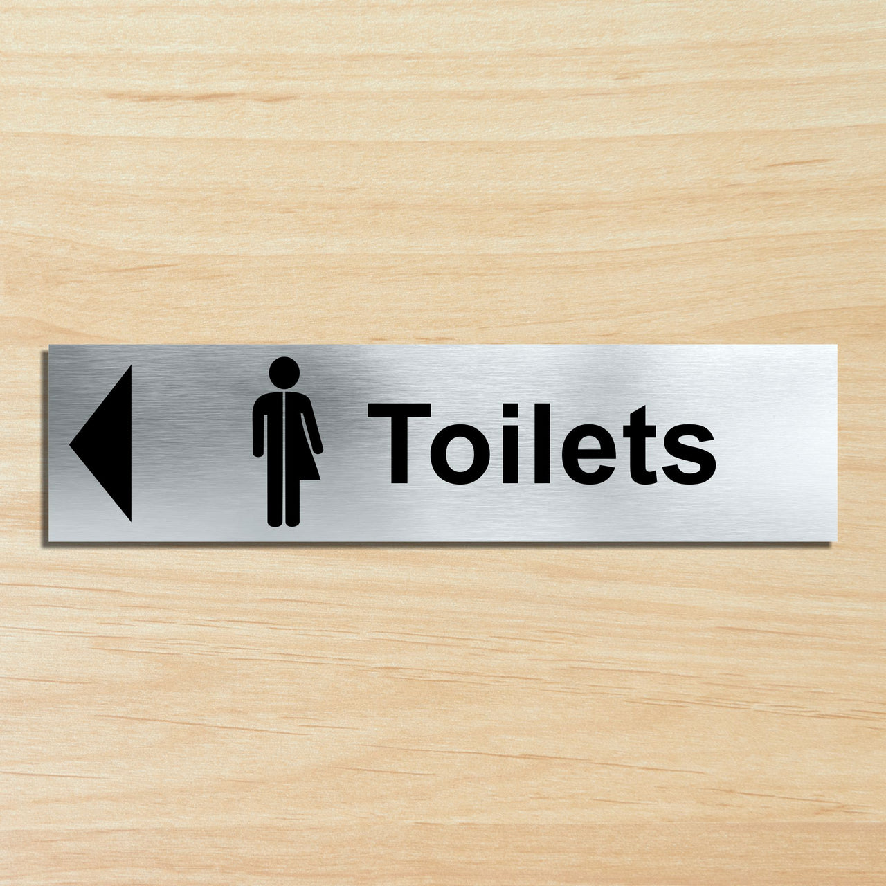 Inclusive Toilet Door Sign with a Left Pointing Directional Arrow