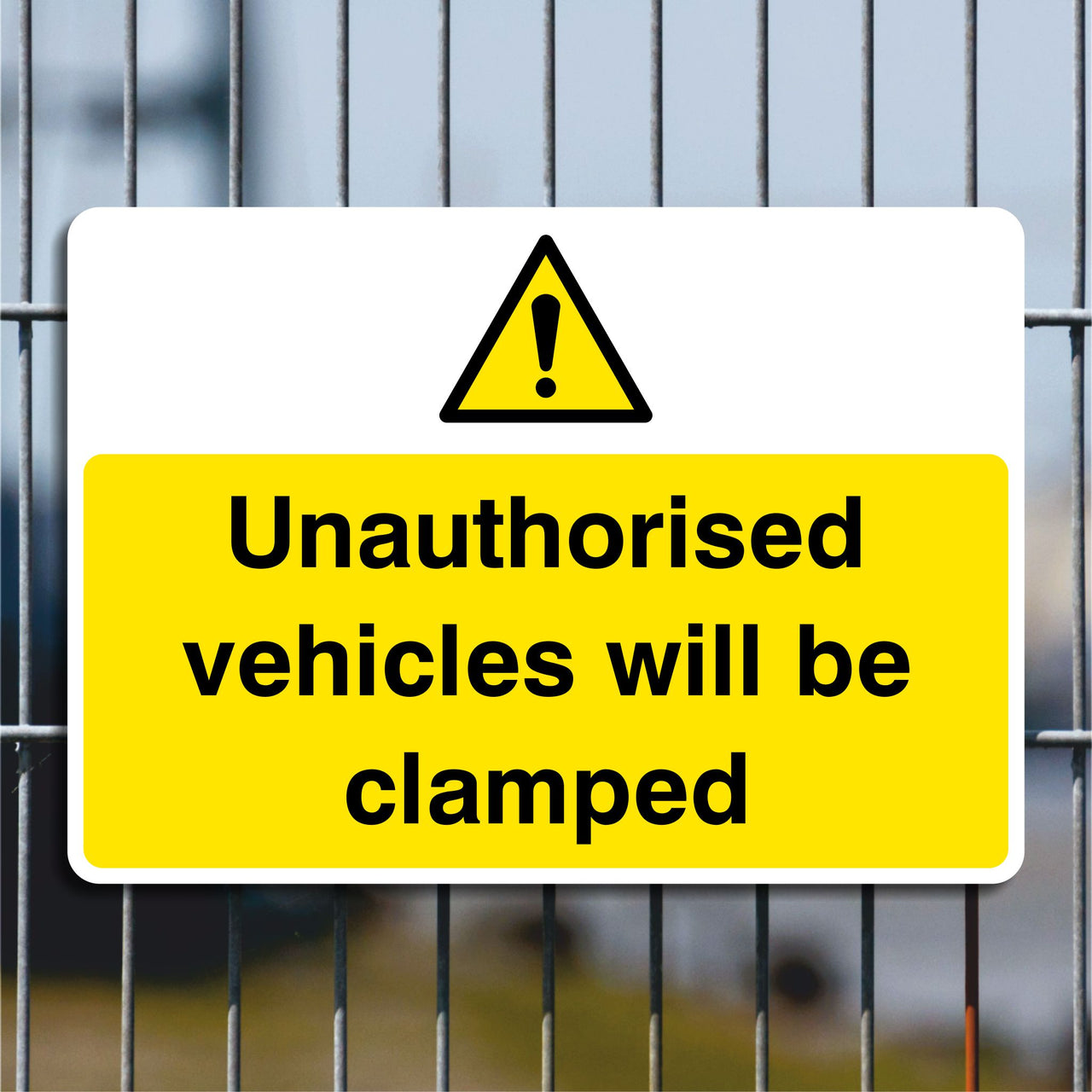Unauthorised Vehicles Will Be Clamped Sign