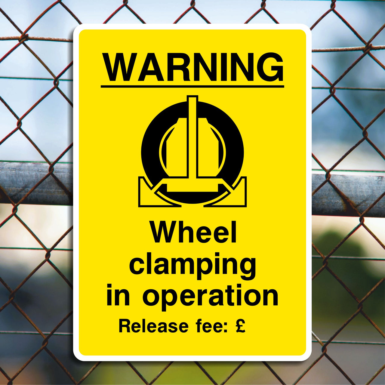 Warning Wheel Clamping in Operation Release Fee Sign